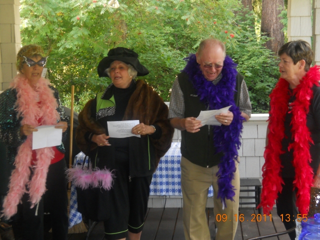 Fran Merrill Allen, Mary McCain McAllister, Jim Halmo and Pat Templin Price practice for the skit