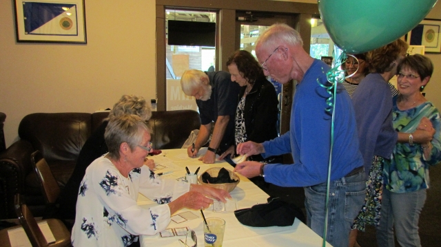 TGIF registration,with Toni Appert Lee and Sharon Martin Kline at the table with Leroy & Evelyn Dunman Smith plus Tim Stratton signing-in and Karen Deyton Colleran welcoming a CP Grad